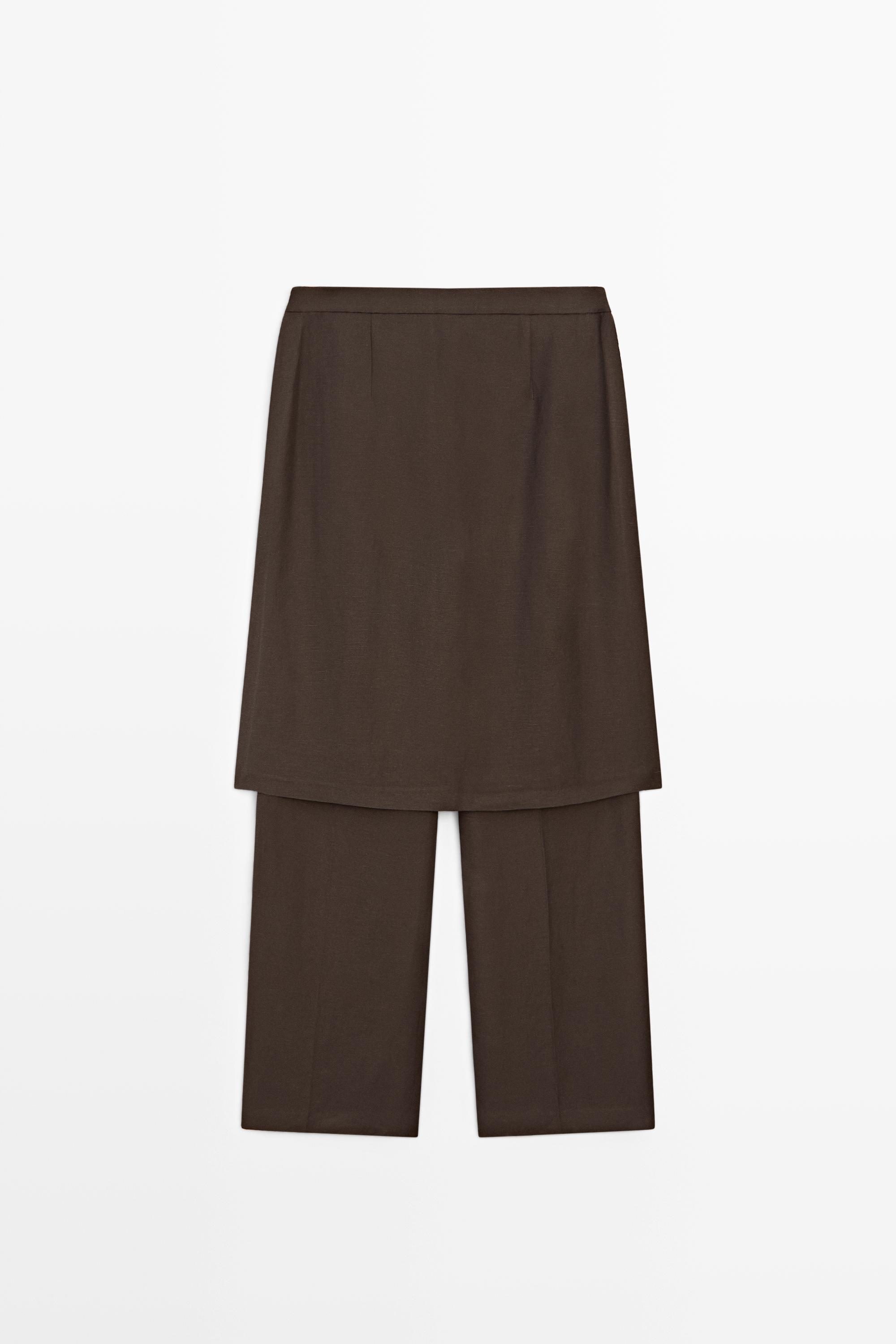 Flowing trousers with skirt detail